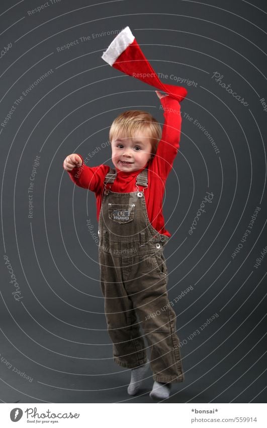 anticipation Playing Christmas & Advent Human being Child Toddler Boy (child) 1 1 - 3 years Overalls Cap Movement To hold on Smiling Jump Dance Throw Blonde