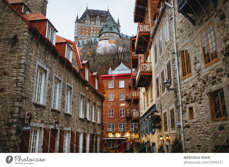 Charming old street with historic architecture in Quebec City in Quebec, Canada quebec city cobblestone building chateau frontenac old town charm traditional