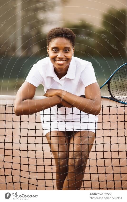 Young women with a racket in a tennis court active lifestyle activity amateur athlete ball beautiful beautiful women cheerful competition enjoyment exercise