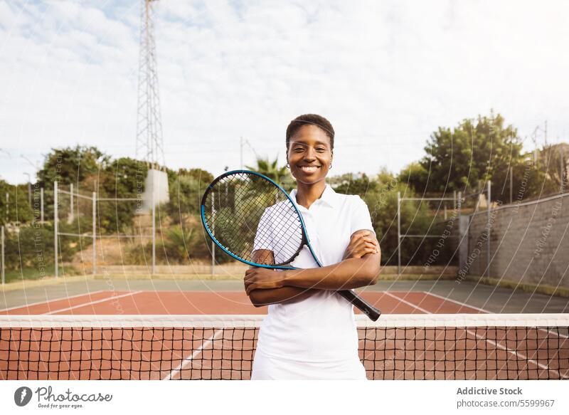 Young women with a racket in a tennis court active lifestyle activity amateur athlete ball beautiful beautiful women cheerful competition enjoyment exercise