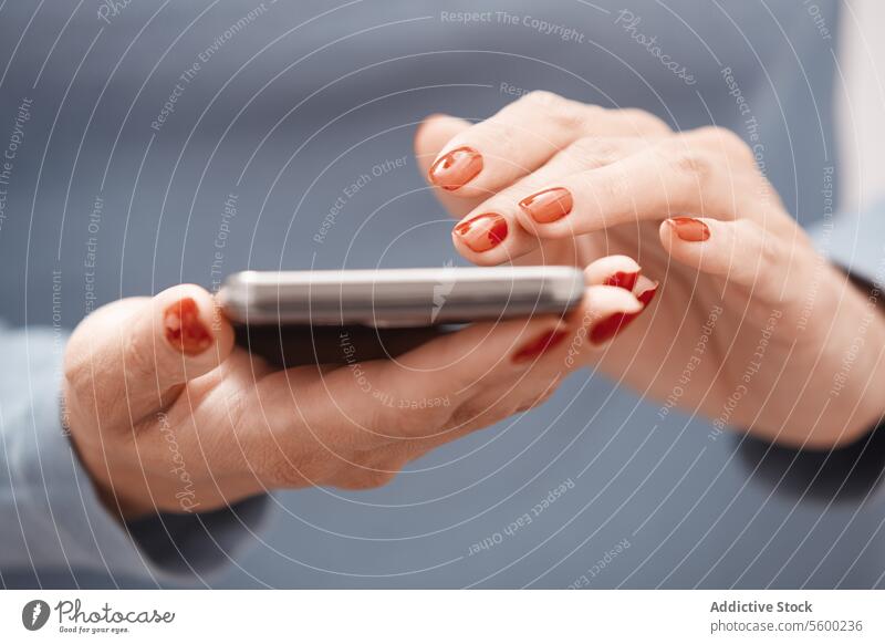 Woman using smartphone Hand technology gadget mobile phone cellphone cellular phone telephone telecommunication SMS wireless electronics modern Internet