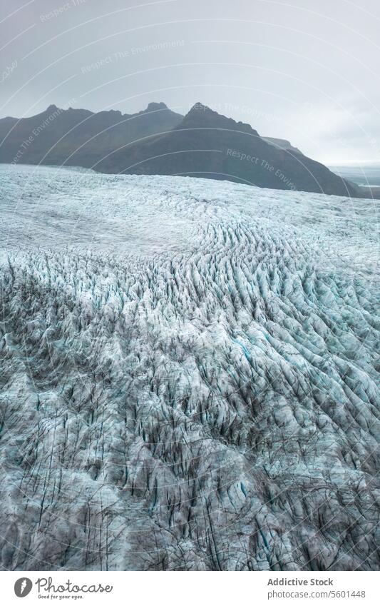 Majestic glacier landscape in Vatnajökull Park, Iceland vatnajökull iceland crevasse mountain rugged terrain park nature outdoor travel adventure cold blue