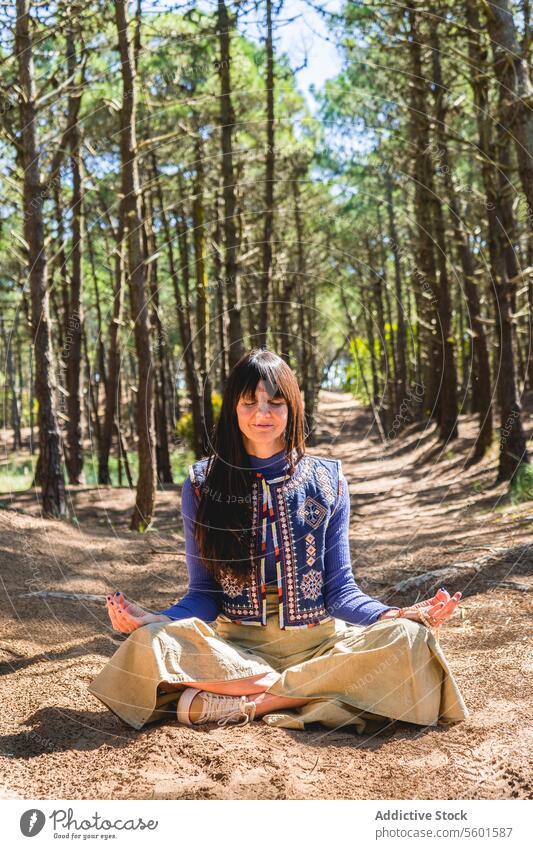 Portrait of an adult woman with her eyes closed while meditating on the woods. Vertical shot Human Hand balance breathe breathing calm calmness clasping