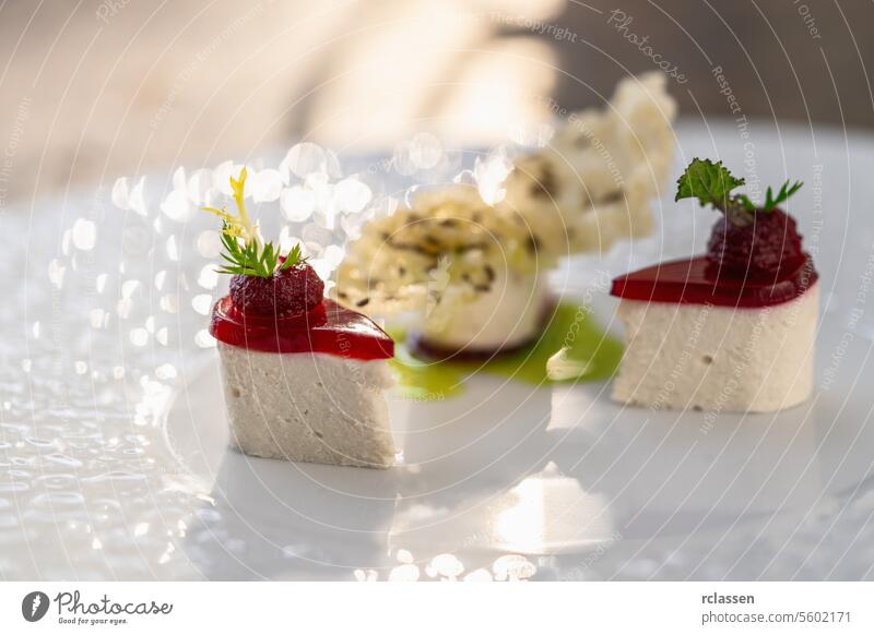 Close-up of a luxury appetizer on a white plate in restaurant, elegant Culinary Presentation. Food Photography Concept image dinner hotel chip rice goat cheese