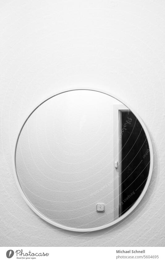 Round mirror in the entrance Entrance Mirror door Front door Deserted Old reflection Reflections Forms and structures Light switch Structures and shapes White