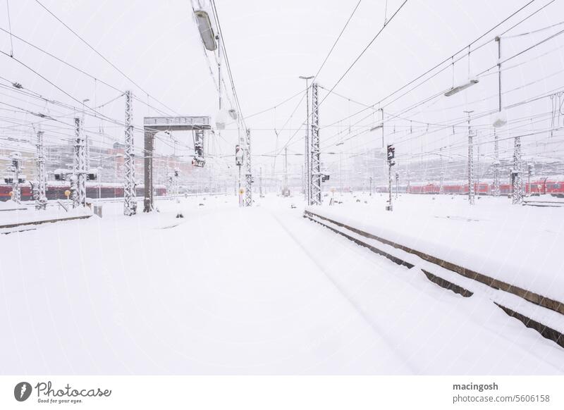 Train station drowns in snow chaos Central station Munich Central Station Railroad Town Transport Exterior shot Deserted Track German Railway Railroad tracks