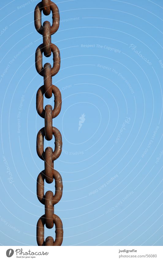Chain against blue sky Chain link Strong Hold Attachment Connectedness Sky Rust Metal Blue Harbour Connection To hold on Feasts & Celebrations