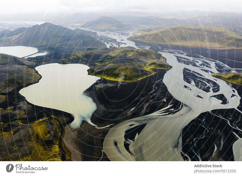 Aerial View of Iceland's River Basins and Terrain iceland aerial view river basin terrain landscape rugged color pattern nature outdoors wilderness environment