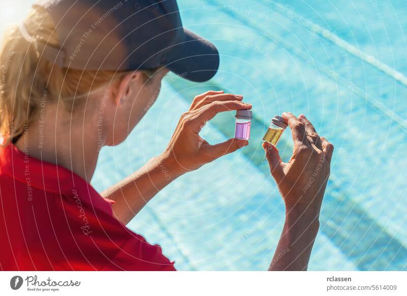 Woman comparing water samples in vials for pH testing against pool background at a hotel wellness spa resort ink liquid yellow liquid value chlorine measure