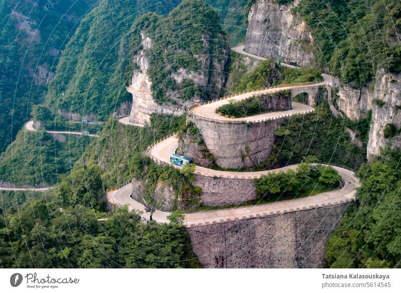 Heaven Linking Avenue on Tianmen Mountain, China zhangjiajie rock asia green forest road sightseeing nature landscape dangerous outdoors curves attraction
