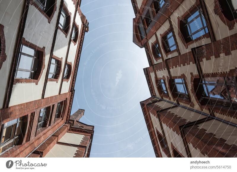 View upwards in the courtyard of a brick building in Hamburg, Germany abstract architectural architecture Background brick expressionism bricks city contor