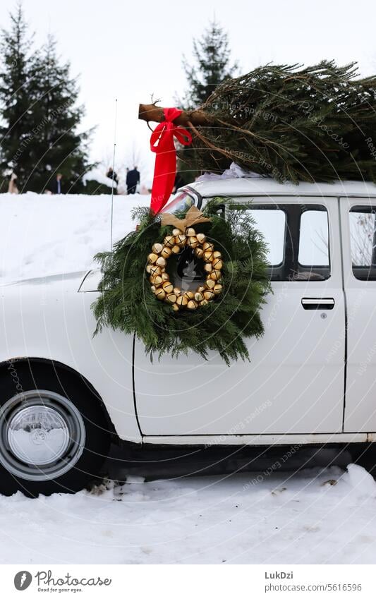 Christmas tree and Christmas decoration on a classic car in a winter day Christmas & Advent Tradition Decoration Christmas mood Christmas Fair x-mas