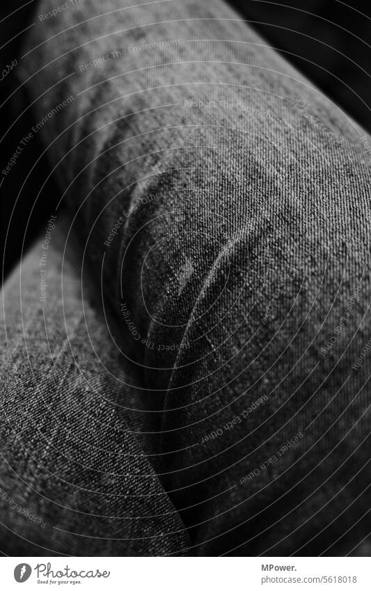 denim Jeans Denim jeans step Legs crossed Folds crease Pants Clothing Close-up Material Footwear Style textile Detail Cotton plant Black & white photo