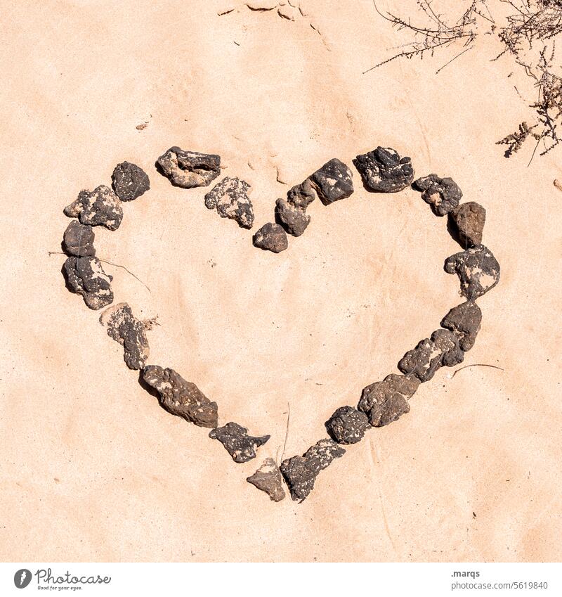 Heart of stone Relationship Declaration of love Infatuation Valentine's Day Emotions Romance Love Warmth Hot Dry Beach Stone Sand Symbols and metaphors