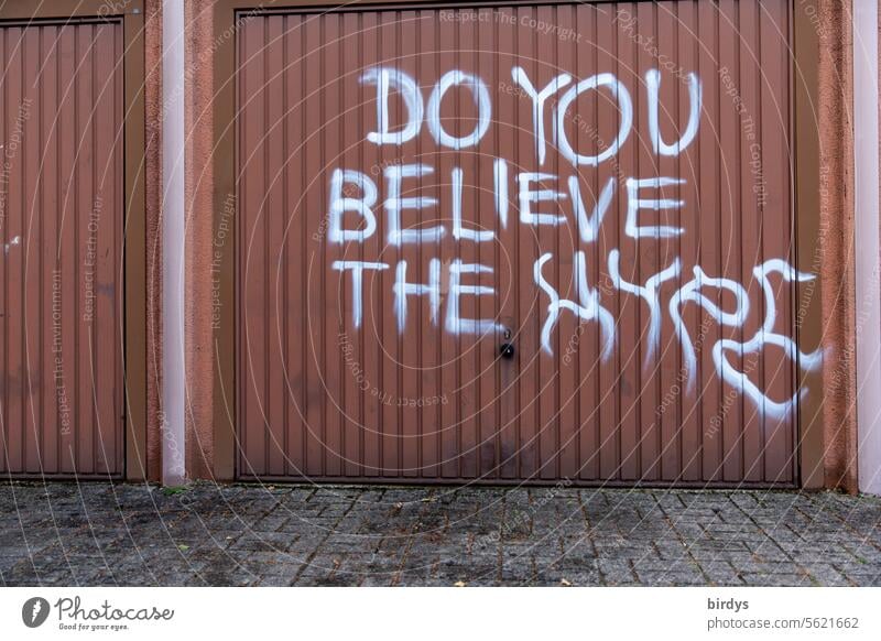 Do you believe the hype ? Writing on a garage door Hype hip Graffiti spectacular question Euphoria Hip & trendy Garage door Characters Enthusiasm Company