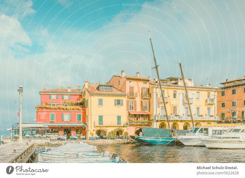 Picturesque harbor on Lake Garada in pastel colors Lago Garda Italy Lombardy Water Harbour seascape port picturesque lake view