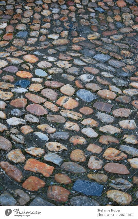 Pavement with colored stones pavers Street Cobblestones coloured stones Old town old street