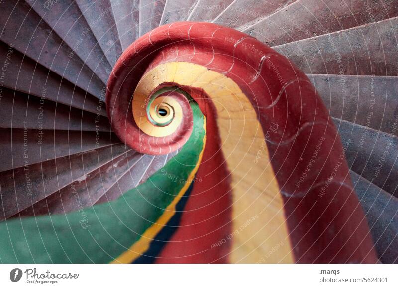 spiral Spiral Downward Stairs Staircase (Hallway) Banister rail Winding staircase Descent Red Yellow Green Old Historic Snail shell Infinity Round