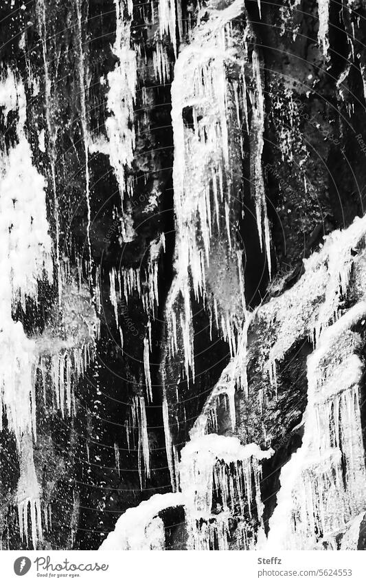 Frozen water at a waterfall in Iceland Waterfall chill Icicle Freeze Cold Freezing icy cold water Hoar frost quick-frozen iced White Fantastic Rock Abstract