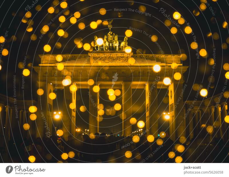 It glitters and sparkles at the Brandenburg Gate Christmas mood Christmas fairy lights Glittering defocused blurriness Fairy lights Illuminate Abstract