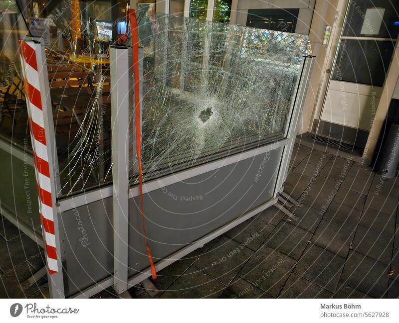 A huge hole in a barrier that is also made of glass Hollow Glass Wall (building) cordon glassy Cologne cologne Town broken Broken