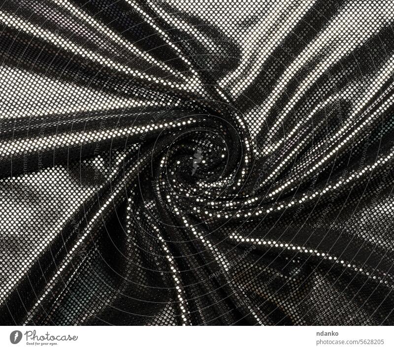 Black fabric with foil elements, wavy surface textile glitter aluminum shiny glow shine glossy backdrop elegance fashion fold fiber curve dot black
