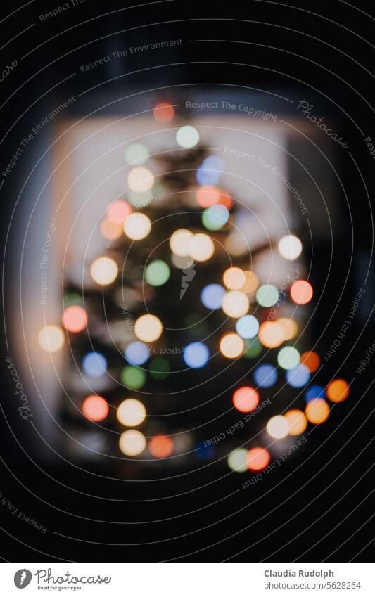 Blurred shot of a Christmas tree with colorful bokeh light balls Christmas & Advent Christmassy fir tree Balls of light Christmas mood