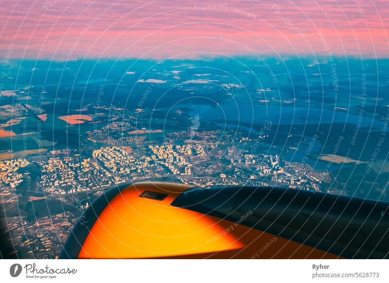 Minsk, Belarus. View From Airplane Window On Minsk. Sunset Sunrise Over City evening river aircraft district travel high flight fly outdoor city aerial view