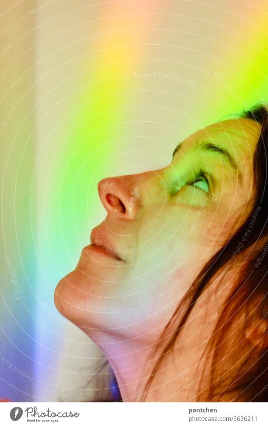 bright, colored light on a woman's face. Beam of light Rainbow Hope Joy Happy Light Tolerant Multicoloured Refraction Prismatic colour Prismatic colors