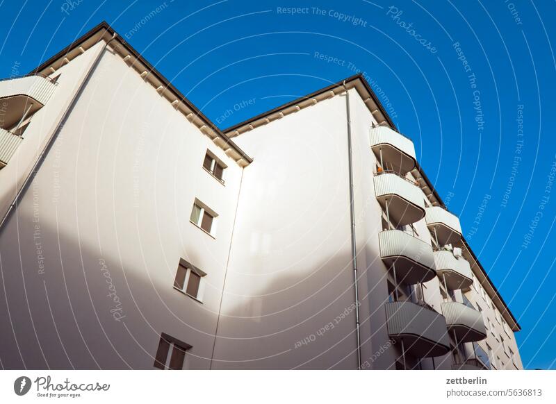 Refurbished apartment block Old building on the outside Fire wall Facade Window House (Residential Structure) Sky Sky blue rear building Backyard Courtyard