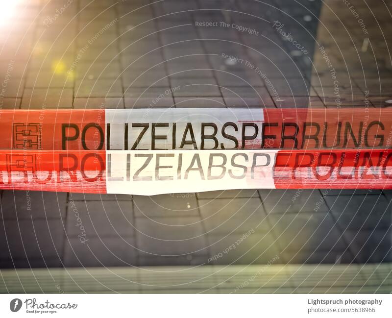 Barrier tape "Polizeiabsperrung" during a police operation in Germany. police force barricade tape accidents and disasters crime cordon - boundary