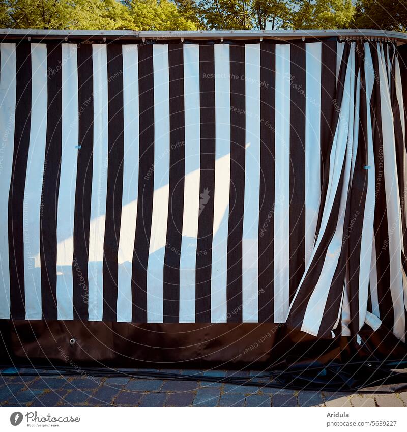 Striped tarpaulin of a market stall Black White Markets Market stall Folds Screening Structures and shapes Plastic Covers (Construction) Pattern