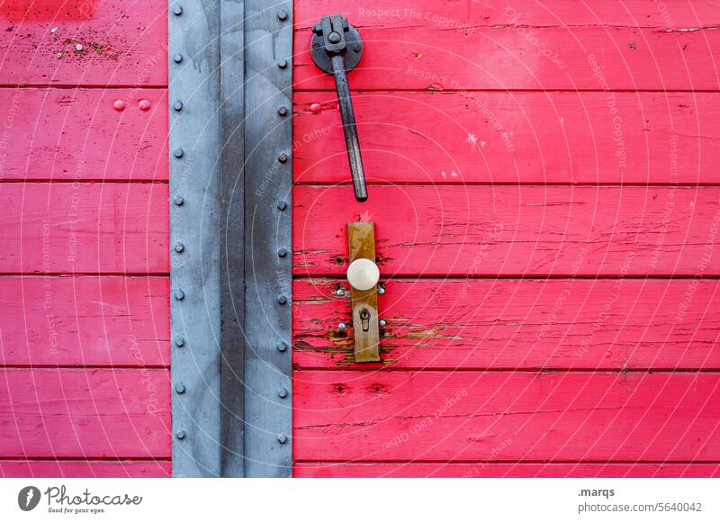 Old pink gate Entrance door Pink Way out door handle wooden slats Front door Closed Safety Wooden wall locked Wooden facade Close-up