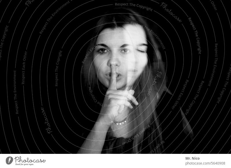 Psssst. To be silent Sign facial expression gesture quiet Forefinger portrait Fingers shush Shake of the head two faces anxiety disorder Emotions Abstract