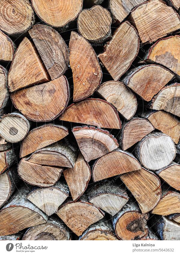 Wood lumber background Stack of wood Supply Timber Fuel Forestry Firewood Tree trunk Logging Energy Heap stacked Nature Environment