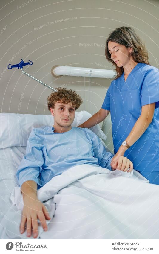 Young female doctor checking health of male patient in hospital man examine serious woman check up clinic work health care medicine crop medical professional