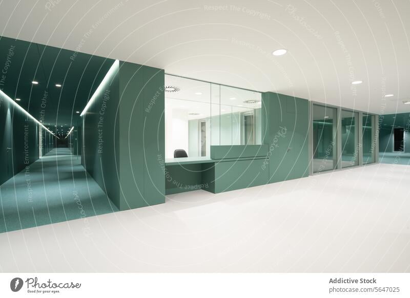 Empty hospital with cabin, glass doors and green walls near illuminated passage Hospital Wall Green Interior Modern Glass Passage Medical Clean Medicine Clinic