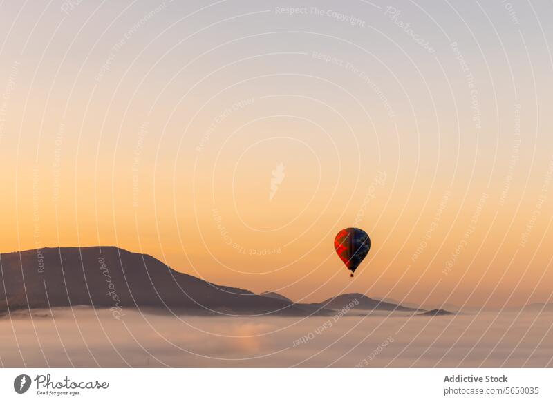 Hot air balloon floating over pyramids at sunset hot air balloon site fly spectacular view moon sky evening tourism landscape travel adventure scenic
