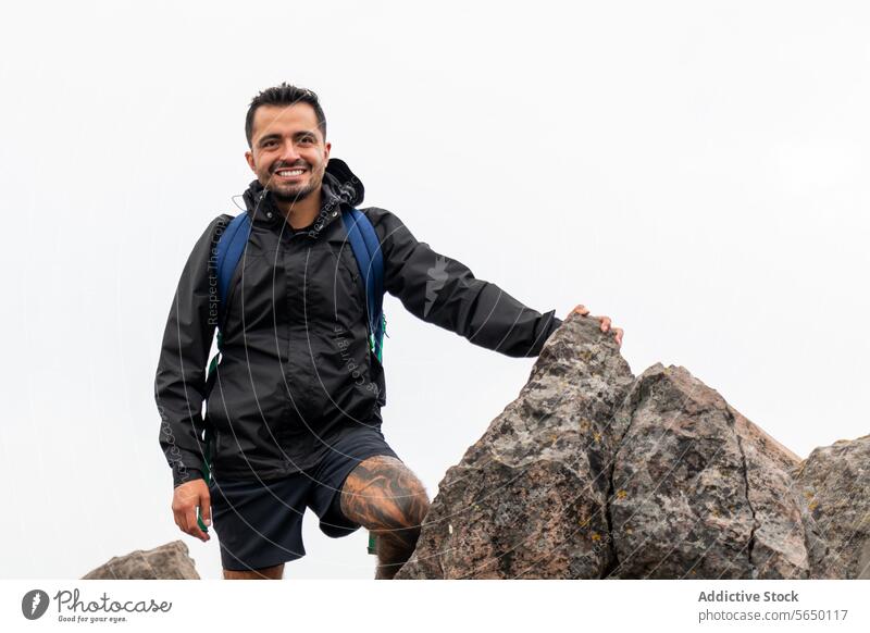 Happy hiker at Ajusco Summit summit rocky smiling backpack Cumbres del Ajusco national park Pico del Águila Mexico City outdoor adventure travel man nature