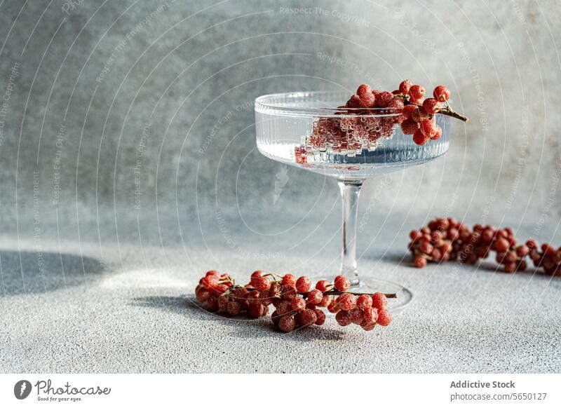 Elegant cocktail glass with grapes on textured background wine elegance grey shadow light tabletop still life fruit luxury beverage drink alcohol stemware