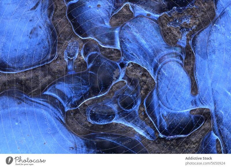 Abstract patterns of blue ice with a hint of brown rock, revealing the intricate beauty of winter's first frost abstract cold texture natural crystalline water