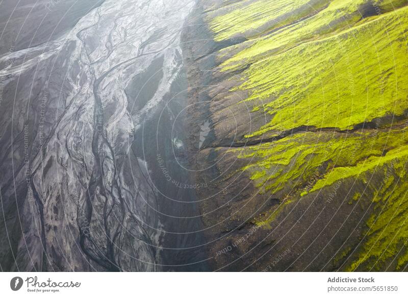 Contrasting Icelandic Landscape with Green Moss aerial highlands landscape green moss volcanic sand contrast nature aerial view topography natural pattern black