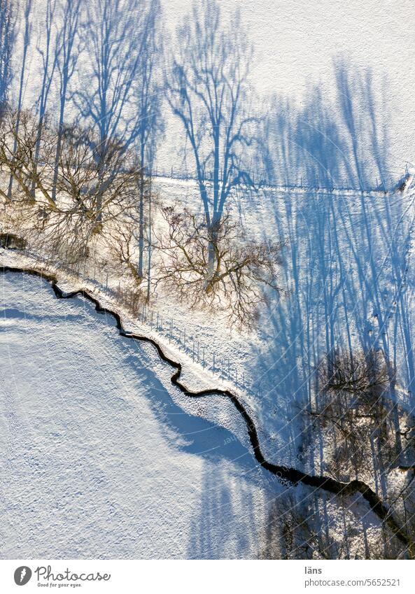 The beautiful side of winter Winter Frost Snow Frozen Ice Cold Sunlight sunshine droning UAV view Nature Brook bachlauf Shadow Shadow play trees Deserted