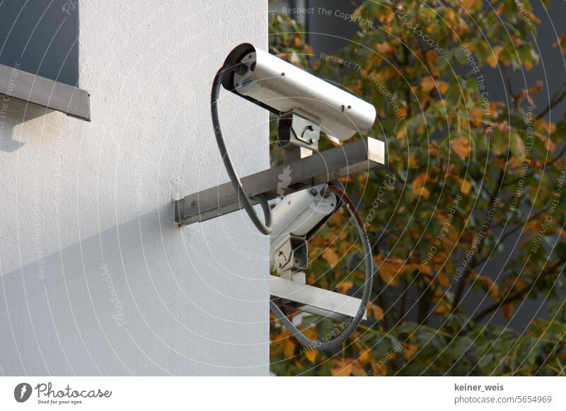 Surveillance cameras on a house in the surveillance state Police state Testing & Control Protection Criminality Video camera Surveillance device Fear