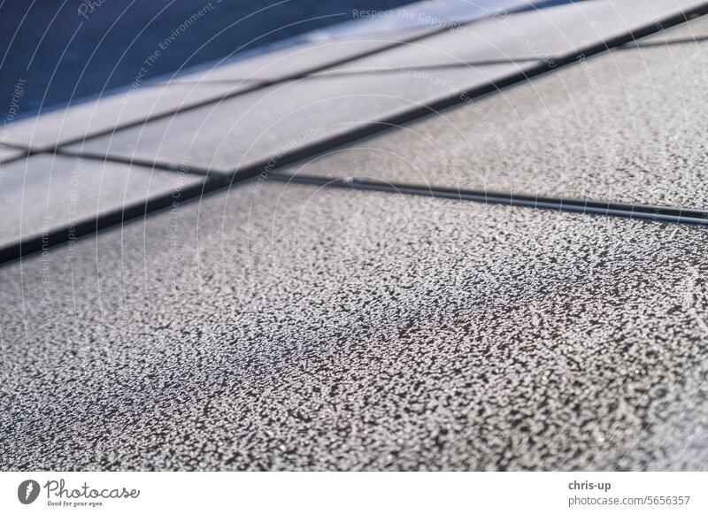 Ice flowers on photovoltaic modules on a cold winter's day photovoltaics Winter Frost solar Sun Frost pattern sunny Renewable energy revolution solar panel