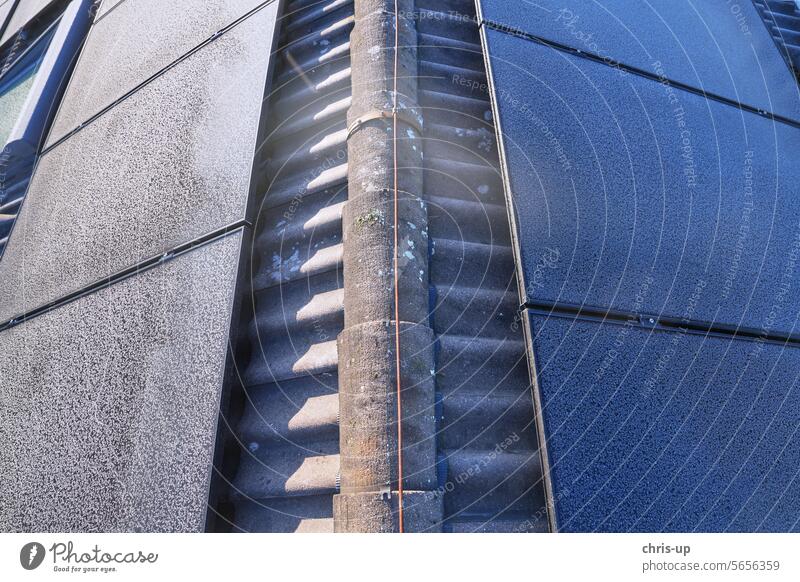Photovoltaic modules in winter with an east-west orientation with sun and shade Energy Winter Frost frosted icily photovoltaics solar solar panel