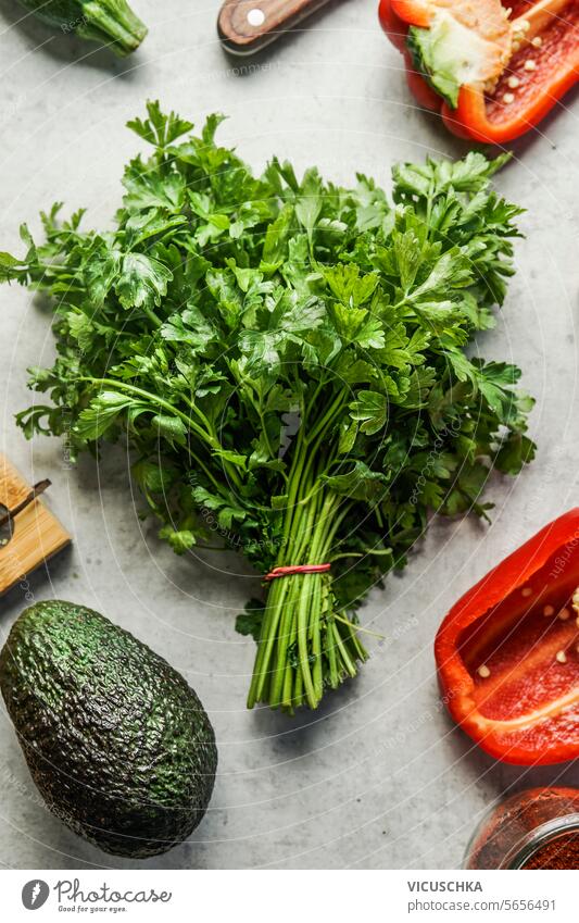 Fresh organic parsley bunch for healthy cooking , top view fresh seasoning herb ingredient raw food
