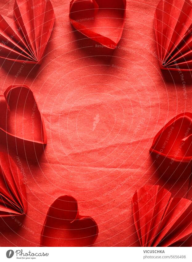 Valentine's day background with flat lay paper hearts frame on red , top view valentine's day abstract valentines day promotion beautiful pattern romantic