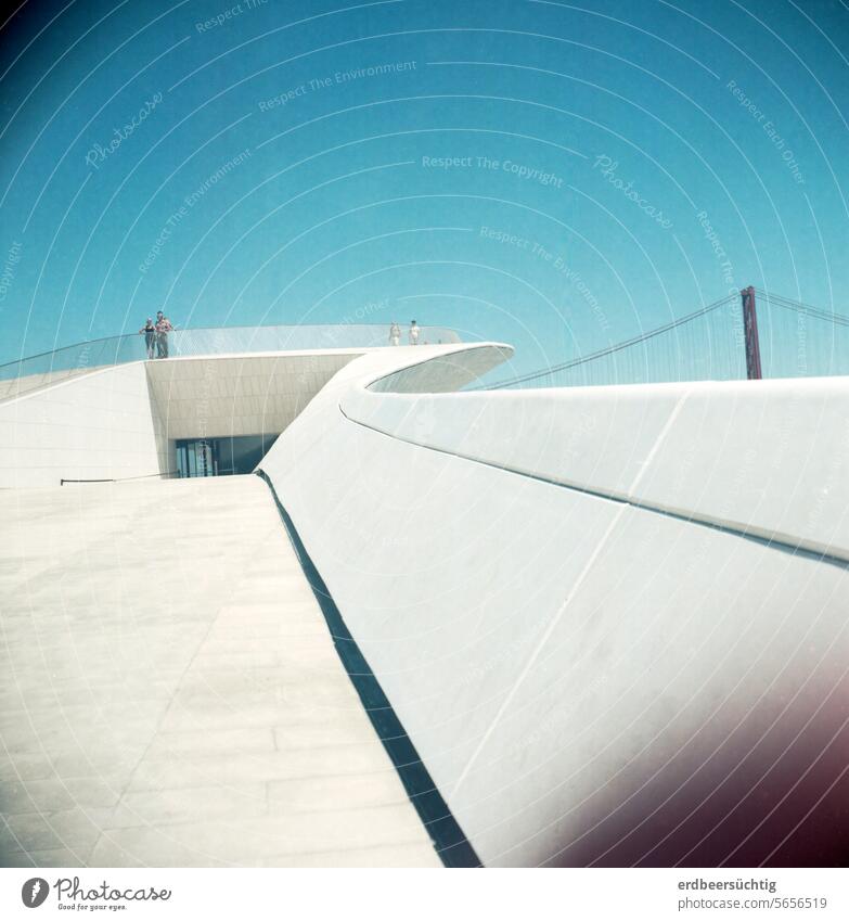 Space shuttle ramp?! - Futuristic architecture of an art museum photographed in retro style, clear lines, blue sky postmodern staircase Ramp Bridge terrace