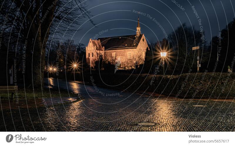 St. Martin's Church in Zetel at night without a lane of bicycle lights believe Dark Frisia Lower Saxony evangelical-lutheran Rain Wet clearer Illuminated